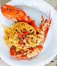 Italian seafood pasta - Spaghetti with big lobster. Close up. Calabrian restaurant Royalty Free Stock Photo