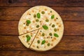 Italian seafood pizza top view at wooden background Royalty Free Stock Photo