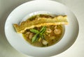 Italian seafood soup with bread and Mint leaves