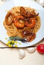 Italian seafood spaghetti pasta on red tomato sauce Royalty Free Stock Photo