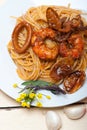 Italian seafood spaghetti pasta on red tomato sauce Royalty Free Stock Photo