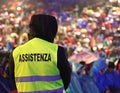 italian security guard during the event with text ASSISTENZA that means Assitance in Italian language Royalty Free Stock Photo