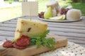 Italian sheep cheese - pecorino with rucola and sun-dried tomatoes Royalty Free Stock Photo