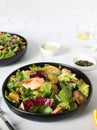 Italian shrimp salad with oranges, red onions, green lettuce, olive oil and sesame seeds. Royalty Free Stock Photo