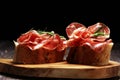 Italian sliced cured coppa with spices. Raw ham. Crudo or jamon with rosemary Royalty Free Stock Photo