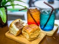 Italian soda and bread stuffed with chocolate. sweet with soda on the table Royalty Free Stock Photo