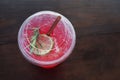 Italian soda with lime in plastic glass. Royalty Free Stock Photo