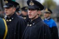 Italian soldiers in ceremonial uniforms take part at the Romanian National Day military parade during a snowy day