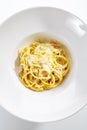 Italian Spaghetti Alla Carbonara with Grated Parmesan Royalty Free Stock Photo