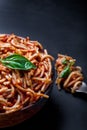 Italian spaghetti with a bolognese tomato meat sauce and basil in a plate. Royalty Free Stock Photo