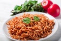 Italian spaghetti with a bolognese tomato meat sauce and basil in a plate. Royalty Free Stock Photo
