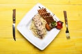 Italian spaghetti with chicken and mushrooms on square plate Royalty Free Stock Photo