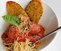 Italian spaghetti and meatballs with toast Royalty Free Stock Photo