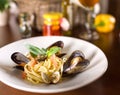 Italian spaghetti with mussels and basil Royalty Free Stock Photo