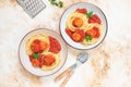 Italian spaghetti pasta with meat balls and tomato sauce served with oregano in two bowls on a light marble table. Top view, copy Royalty Free Stock Photo