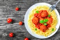 Italian spahgetti with meatballs and tomato sauce, top view