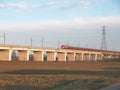 Italian speed train Frecciarossa crossing viaduct