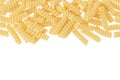 Italian spiral shaped pasta, Fusilli bucati macaroni, isolated on white background. Top view with copy space for your Royalty Free Stock Photo