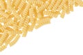 Italian spiral shaped pasta, Fusilli bucati macaroni, isolated on white background. Top view with copy space for your Royalty Free Stock Photo