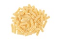 Italian spiral shaped pasta, Fusilli bucati macaroni, isolated on white background. Top view. Flat lay. Royalty Free Stock Photo