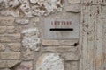 An italian stone letterbox in a medieval village. Ancient mailbox in Italy