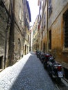 Italian Street with Motorscooters, Pizzeria and Cobblestones
