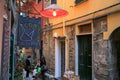 Italian street with wine bar in Liguria, Italy Royalty Free Stock Photo