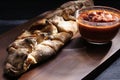 italian stromboli, pizza arrotolata Royalty Free Stock Photo