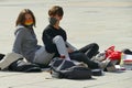 Italian students protest against the government`s choice to close schools by following remote lessons on the sidewalk