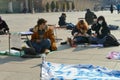 Italian students protest against the government`s choice to close schools by following remote lessons on the sidewalk