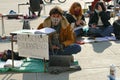 Italian students protest against the government`s choice to close schools by following remote lessons on the sidewalk