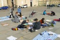 Italian students protest against the government`s choice to close schools by following remote lessons on the sidewalk