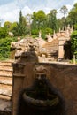 Italian style Mediterranean garden, with a ornamental staircase with statues. Majorca, Spain Royalty Free Stock Photo