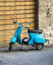 Italian style light blue motorcycle Royalty Free Stock Photo
