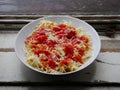 Italian style pasta dish, tomato sauce, porcelain plate