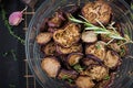 Italian sun-dried eggplant on a dark table. Preserved food.