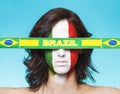 Italian supporter for FIFA 2014 with Brazil flag Royalty Free Stock Photo