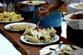 Italian Taleggio cheese tasting on a buffet table at a dinner party - delicious cheese plates on a wooden table, food for wine