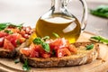 Italian tomato bruschetta with basil, garlic and olive oil on grilled or toasted crusty ciabatta bread, banner, menu Royalty Free Stock Photo