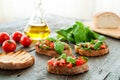 Italian tomato bruschetta with chopped vegetables Royalty Free Stock Photo