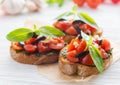 Italian tomato bruschetta with chopped vegetables, herbs and oil Royalty Free Stock Photo