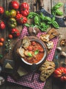 Italian tomato and garlic soup with basil, bread, Parmesan cheese Royalty Free Stock Photo