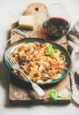 Italian traditional pasta dinner with tagliatelle bolognese and red wine Royalty Free Stock Photo