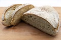 Classic italian Tuscan Bread on wooden cutting board.