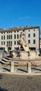 Italian urban landscape with a view of the stone pool. Tourism