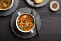 Italian vegetable soup with bean, mix of mushrooms, tomatoes and chard. Royalty Free Stock Photo