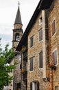 Italian village building with bell clock tower