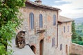 Italian village with cat in courtyard of rural house. Green trees and calmness over countryside Royalty Free Stock Photo