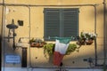 Italian Window with Wooden Shutters in a brick wall Royalty Free Stock Photo