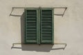 Italian Window with Wooden Shutters in a brick wall Royalty Free Stock Photo